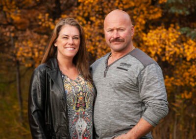 “Portrait of parents together as part of an extended family session, captured by David Thielen Photographic Artistry”
