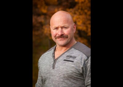 “Portrait of a father from an extended family session, captured by David Thielen Photographic Artistry”